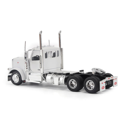 A detailed model of a classic white Peterbilt Model 589 day cab semi-truck cab with chrome exhausts, chrome wheels, and a black fuel tank and tires on a white background.