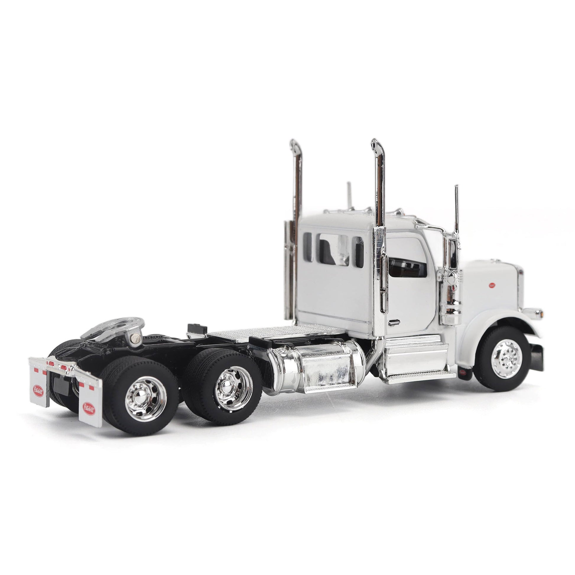 A detailed model of a classic white Peterbilt Model 589 day cab semi-truck cab with chrome exhausts, chrome wheels, and a black fuel tank and tires on a white background.