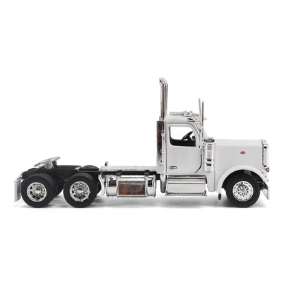 A detailed model of a classic white Peterbilt Model 589 day cab semi-truck cab with chrome exhausts, chrome wheels, and a black fuel tank and tires on a white background.