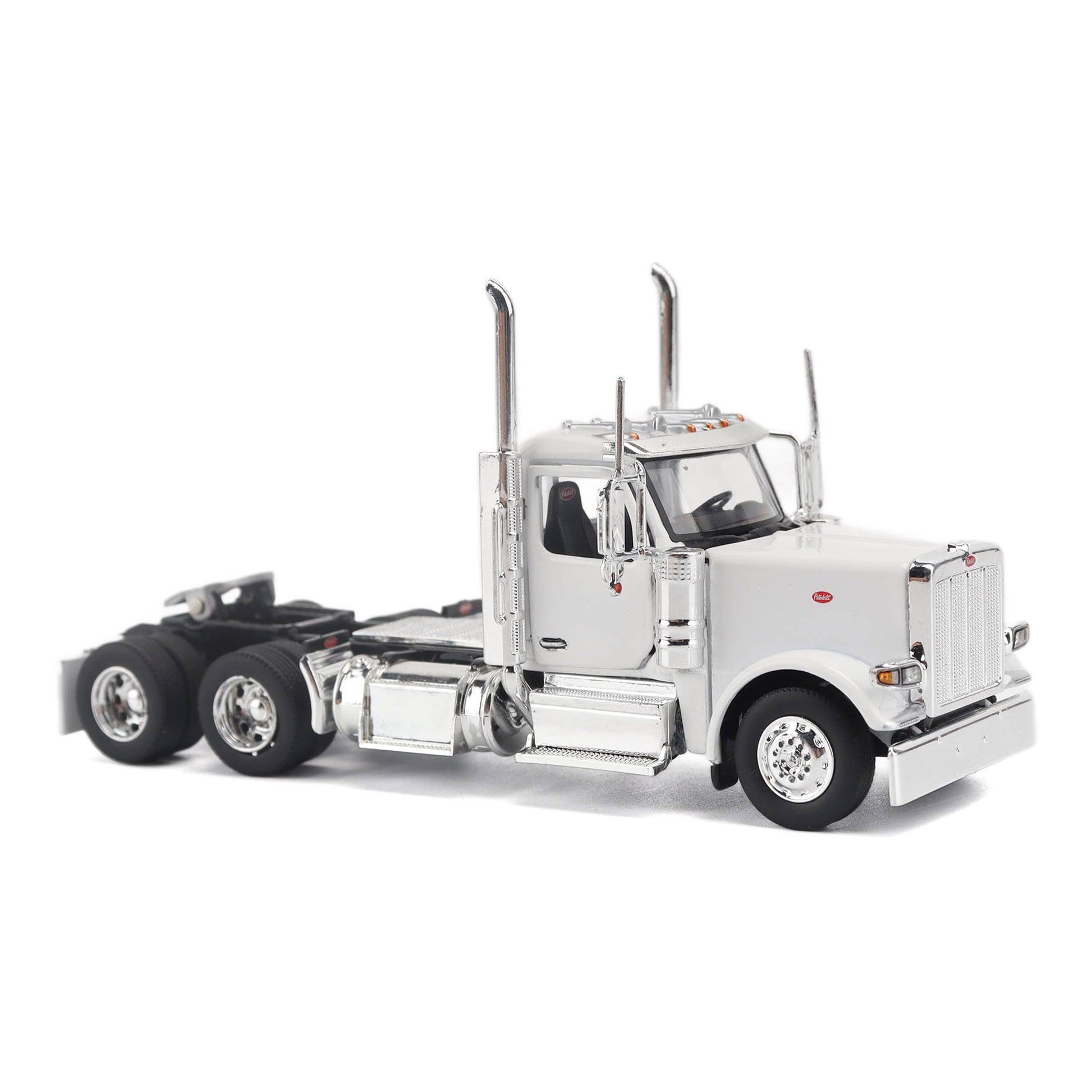 A detailed model of a classic white Peterbilt Model 589 day cab semi-truck cab with chrome exhausts, chrome wheels, and a black fuel tank and tires on a white background.
