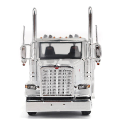 A detailed model of a classic white Peterbilt Model 589 day cab semi-truck cab with chrome exhausts, chrome wheels, and a black fuel tank and tires on a white background.