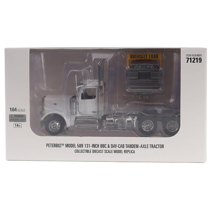 Peterbilt Model 589 131-inch BBC & Day Cab Tandem-Axle Tractor diecast scale model replica in its original white packaging box.