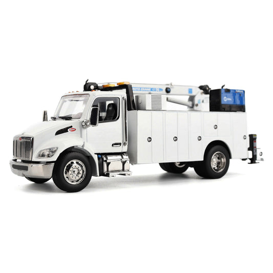 A White Diecast Model of a Peterbilt Model 536 Service Truck on a White Background