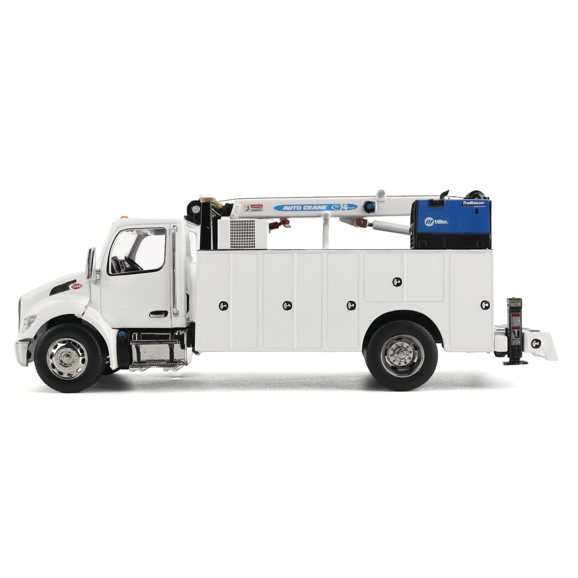 A White Diecast Model of a Peterbilt Model 536 Service Truck on a White Background