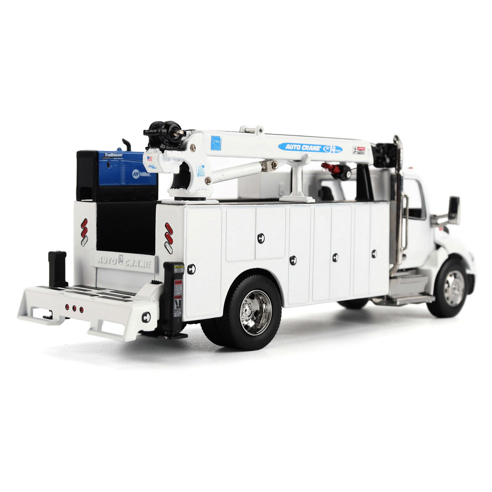 A White Diecast Model of a Peterbilt Model 536 Service Truck on a White Background