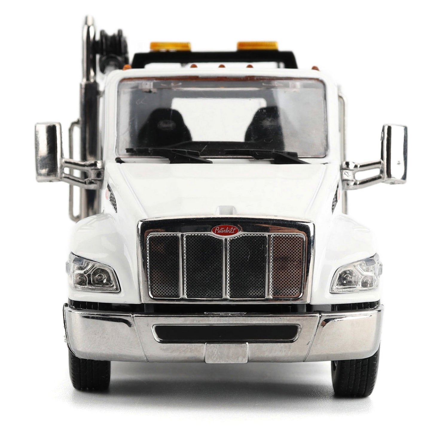 A White Diecast Model of a Peterbilt Model 536 Service Truck on a White Background