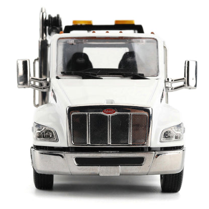 A White Diecast Model of a Peterbilt Model 536 Service Truck on a White Background