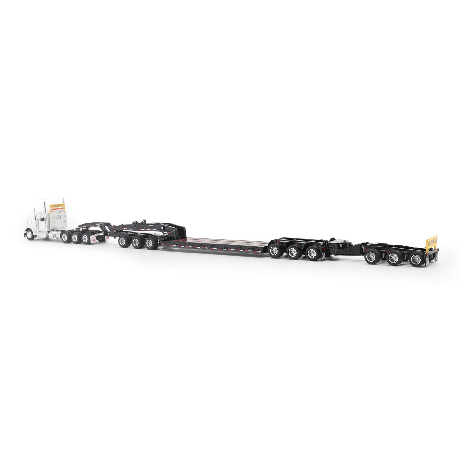 Model of a Peterbilt 589 Day Cab Pulling a Trail King TK170 RGN Trailer with Jeep and Stinger on a White Background
