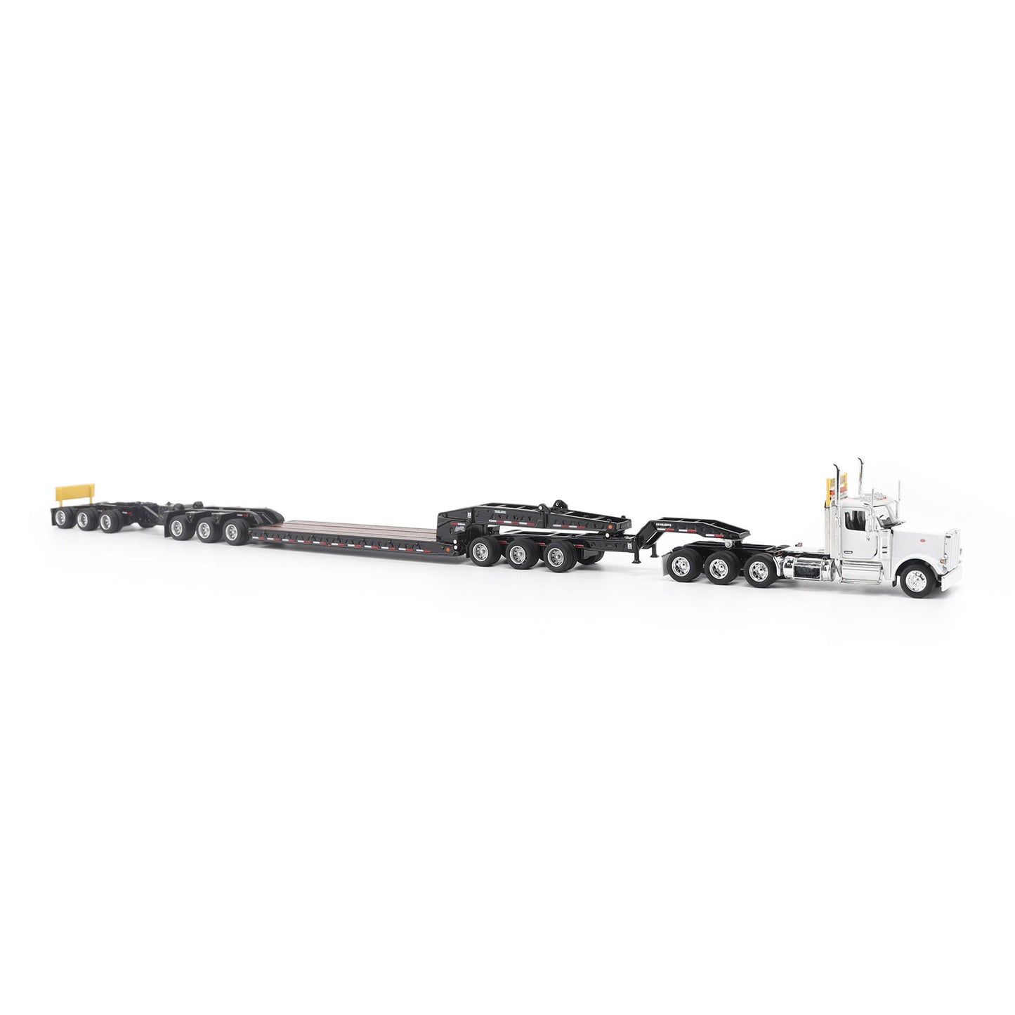 Model of a Peterbilt 589 Day Cab Pulling a Trail King TK170 RGN Trailer with Jeep and Stinger on a White Background