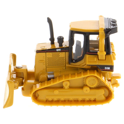 Yellow toy bulldozer with black accents on a white background