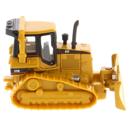 Yellow toy bulldozer with detailed features on a white background