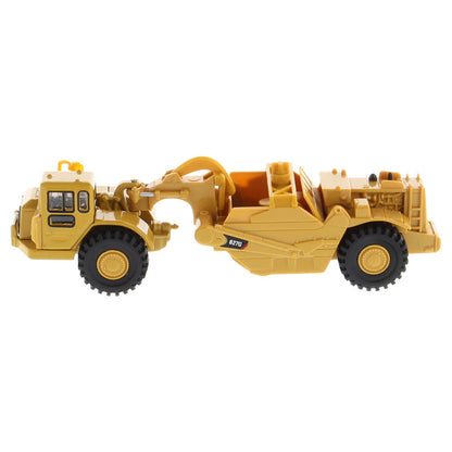 Model of a Caterpillar 627G Wheel Tractor Auger Scraper on a White Background