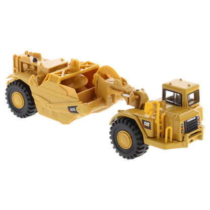 Model of a Caterpillar 627G Wheel Tractor Auger Scraper on a White Background