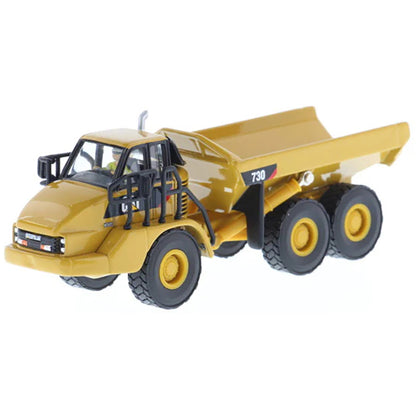 1:87 Scale Diecast and Plastic Model of a Yellow Caterpillar 730 Articulated Dump Truck on a White Background