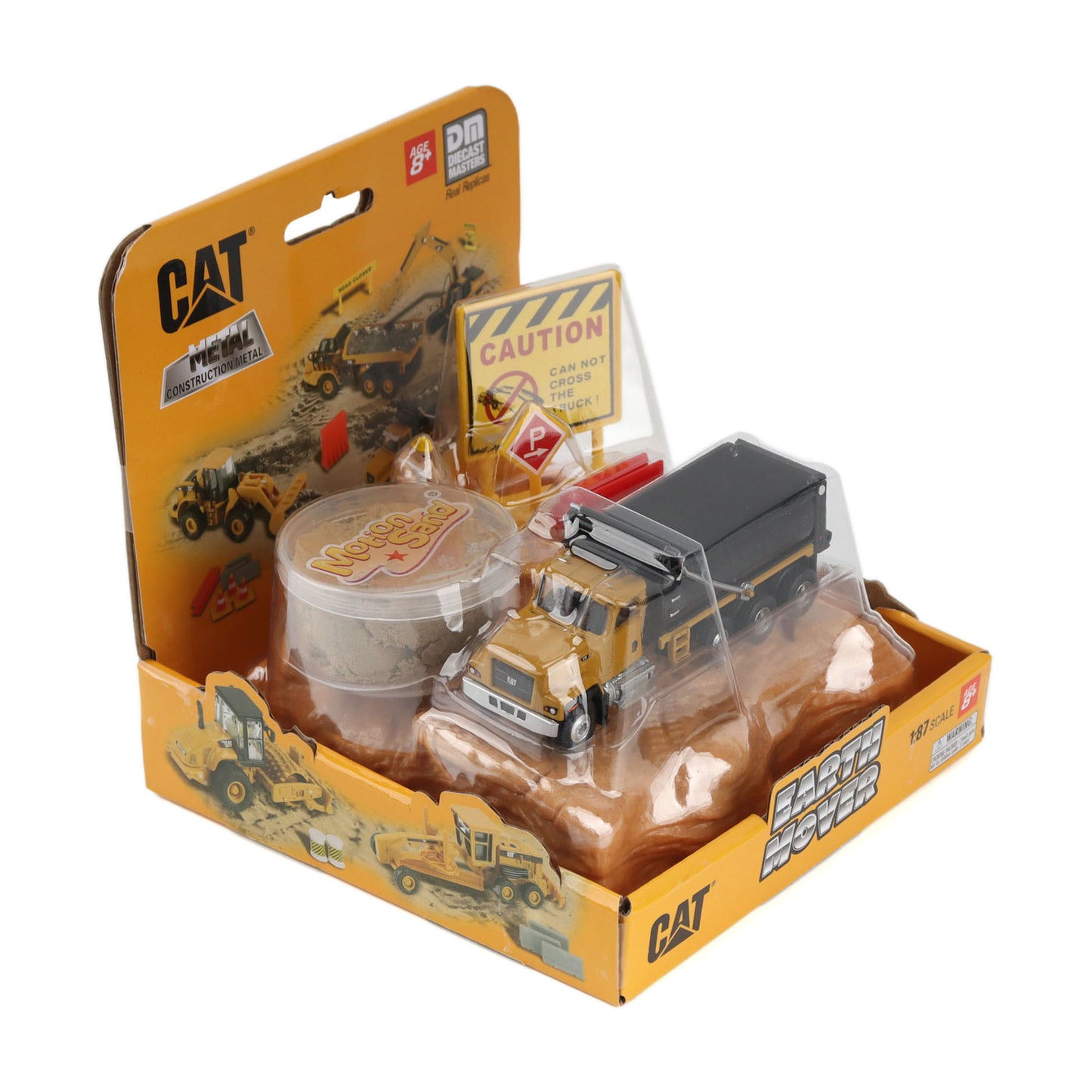 CAT Construction toy set in its original retail packaging, featuring a yellow CAT brand dump truck, a container of sand, and a caution sign on a white background.