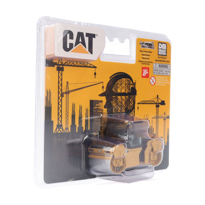 CAT brand toy construction vehicle in blister packaging with a yellow and black printed backing card showing cranes and a construction site graphic.