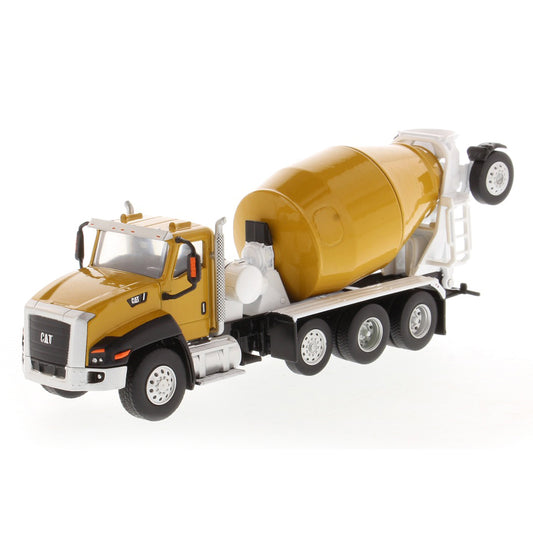 A miniature yellow and white CAT cement mixer truck model, shown from a three-quarter angle on a clean white background.