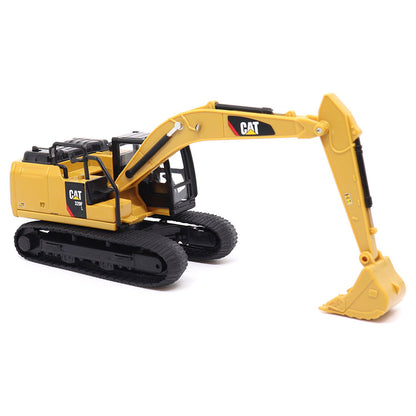 Yellow toy excavator with black tracks on a white background