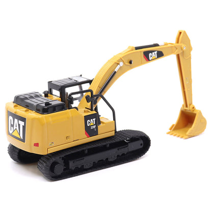 Toy excavator with Caterpillar logo on a white background