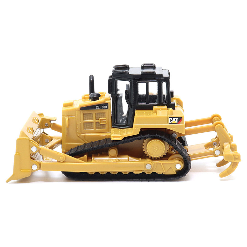 A yellow and black CAT toy bulldozer with a detailed cab, tracks, and front blade, photographed on a clean white background.