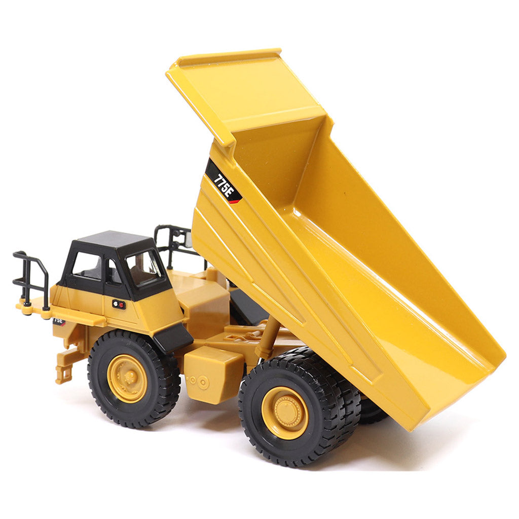 1:64 Scale Diecast Model of a Yellow and Black Caterpillar 775E Mining Dump Truck on a White Background