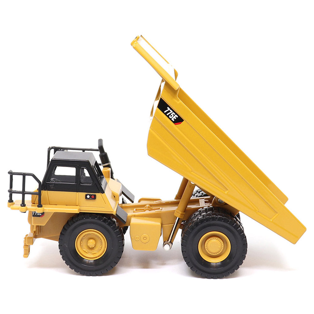1:64 Scale Diecast Model of a Yellow and Black Caterpillar 775E Mining Dump Truck on a White Background