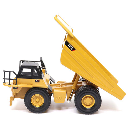 1:64 Scale Diecast Model of a Yellow and Black Caterpillar 775E Mining Dump Truck on a White Background