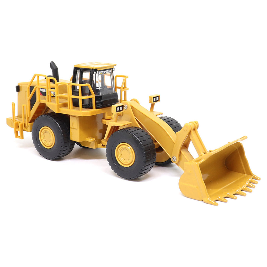 1:64th Scale Model of a CAT Yellow and Black Caterpillar 988H Wheel Loader on a White Background