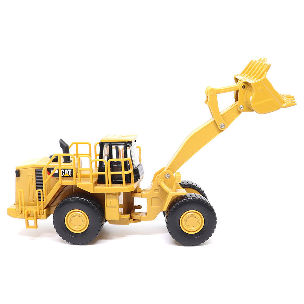 1:64th Scale Model of a CAT Yellow and Black Caterpillar 988H Wheel Loader on a White Background