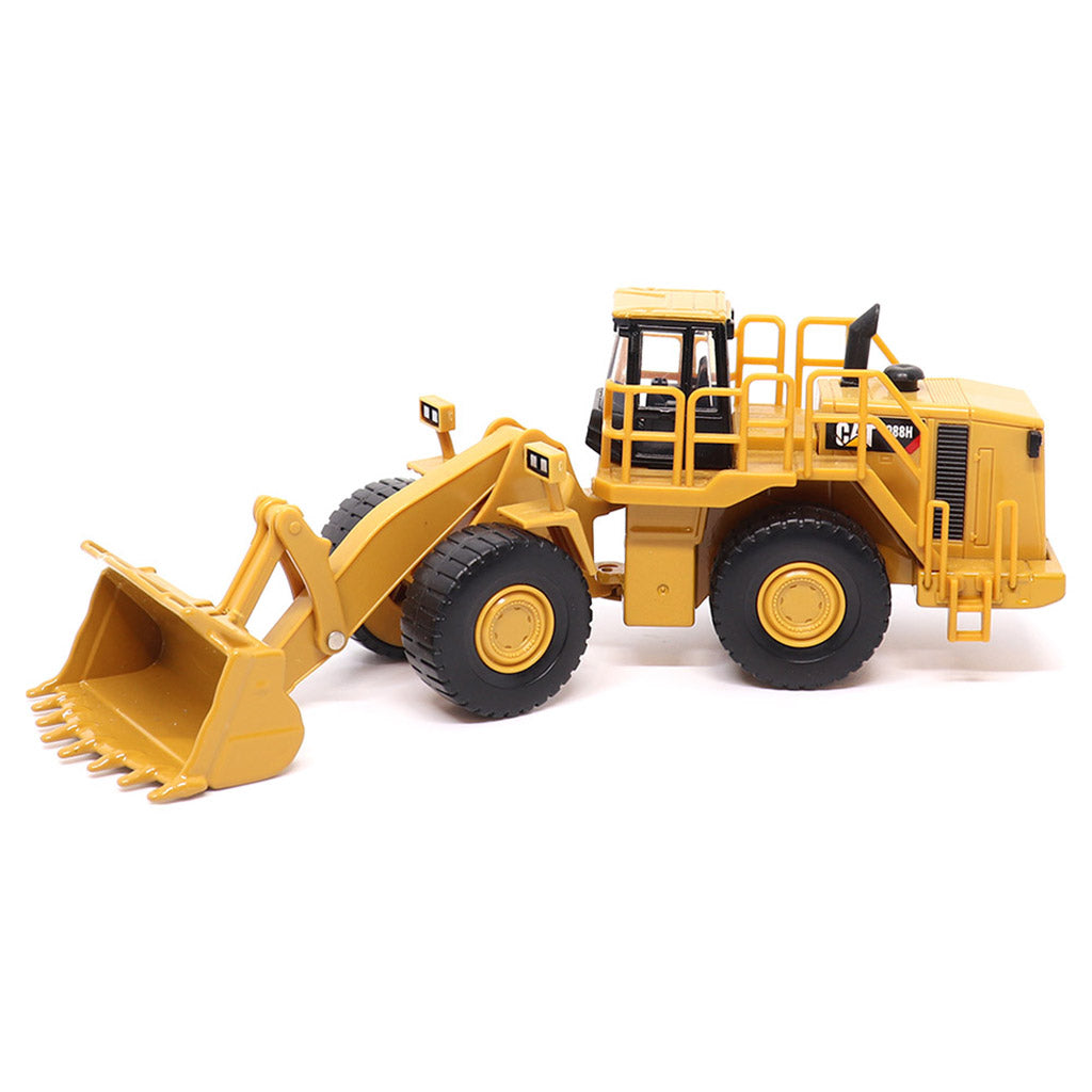 1:64th Scale Model of a CAT Yellow and Black Caterpillar 988H Wheel Loader on a White Background