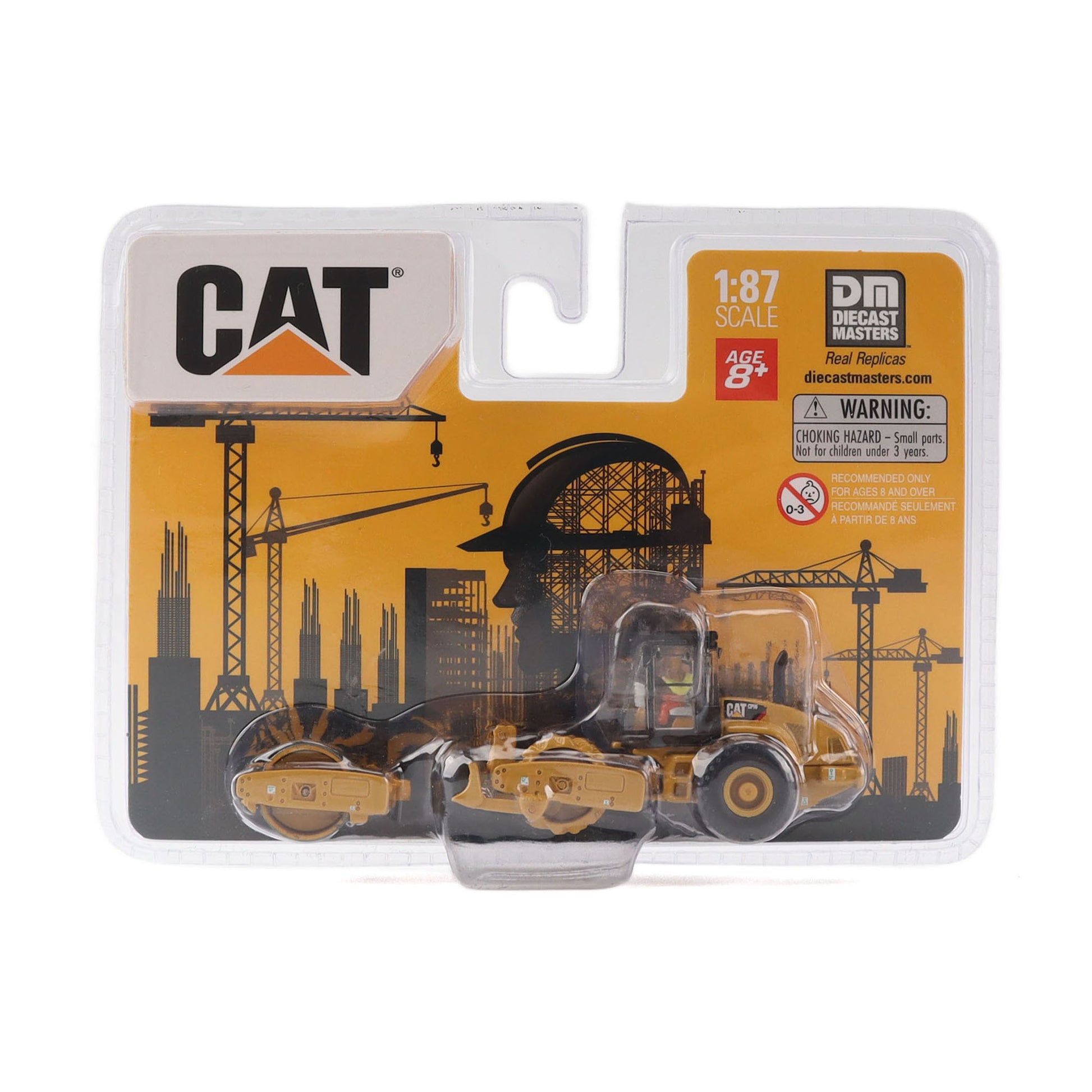 A 1:87 scale diecast model of a CAT roller set in its original blister packaging by Decade Masters. The packaging features a yellow and black industrial graphic background with the CAT logo and a warning label.