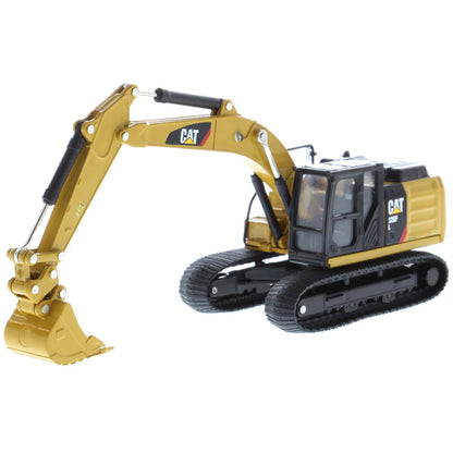 Model excavator with Cat logo on a white background