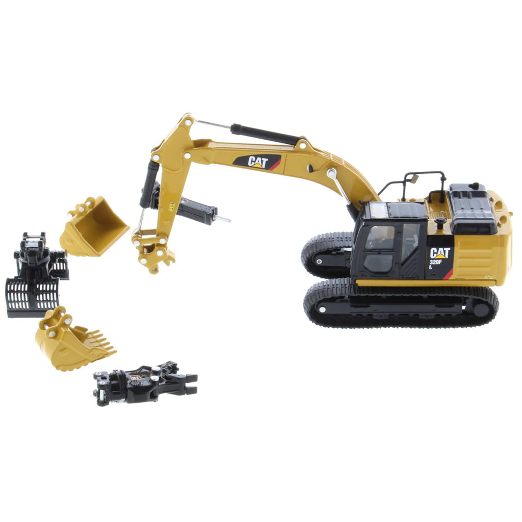 Toy excavator with interchangeable attachments on a white background