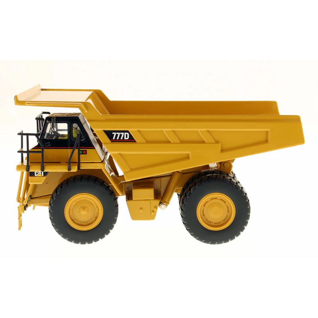 Model of a Caterpillar 777D Off-Highway Dump Truck on a White Background