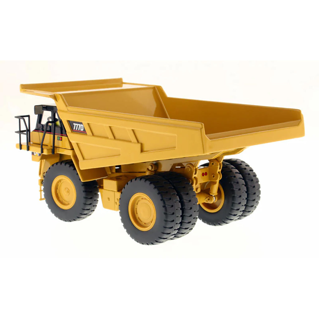 Model of a Caterpillar 777D Off-Highway Dump Truck on a White Background