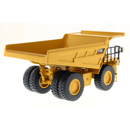 Model of a Caterpillar 777D Off-Highway Dump Truck on a White Background