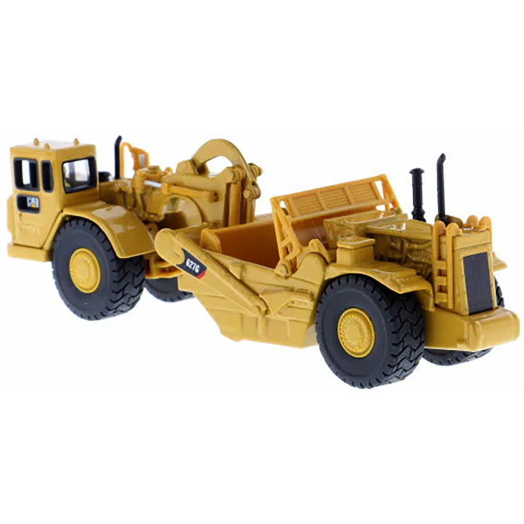 Model of a Caterpillar 627G Wheel Tractor Scraper on a White Background