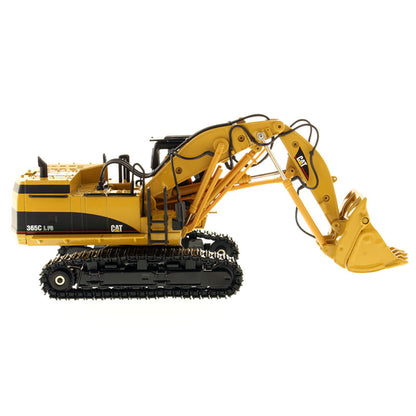 Model of a Caterpillar 365C Front Shovel on a White Background