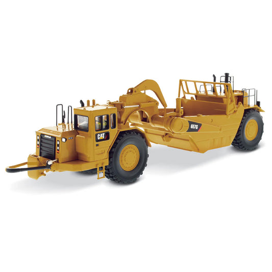 A yellow Caterpillar 657G Wheel Tractor Scraper toy vehicle with black and gray details, part of the High Line Series.