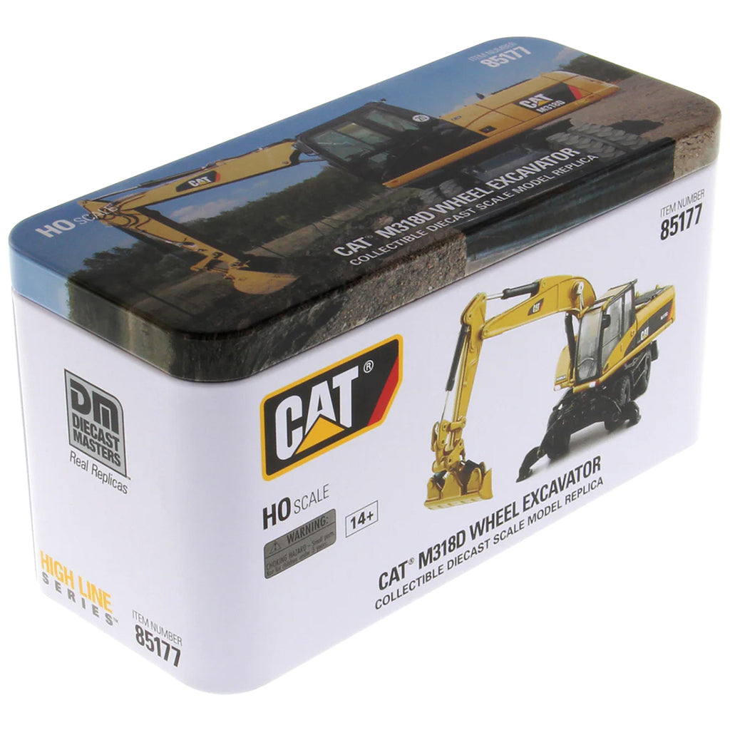 Model of a Caterpillar M318D Wheeled Excavator in Tin Box Packaging on a White Background