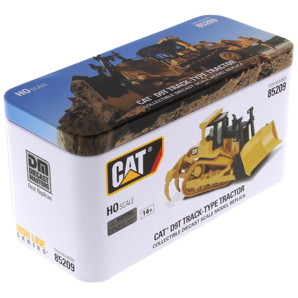 Boxed model of a Caterpillar D9T track-type tractor with branding and product details.