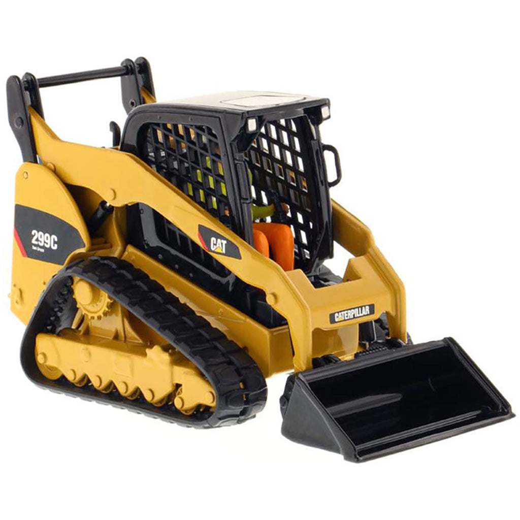 Model of a Caterpillar 299C compact track loader on a white background