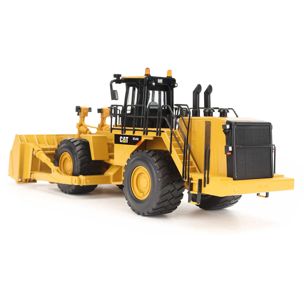 Model of a Caterpillar 854K Wheel Dozer on a White Background