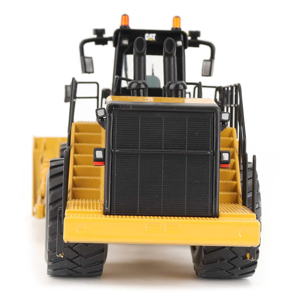 Model of a Caterpillar 854K Wheel Dozer on a White Background