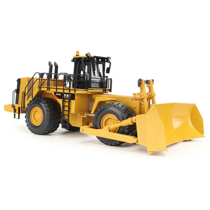 Model of a Caterpillar 854K Wheel Dozer on a White Background