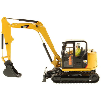 Model of a Caterpillar 302E Mini-Excavator on a White Background