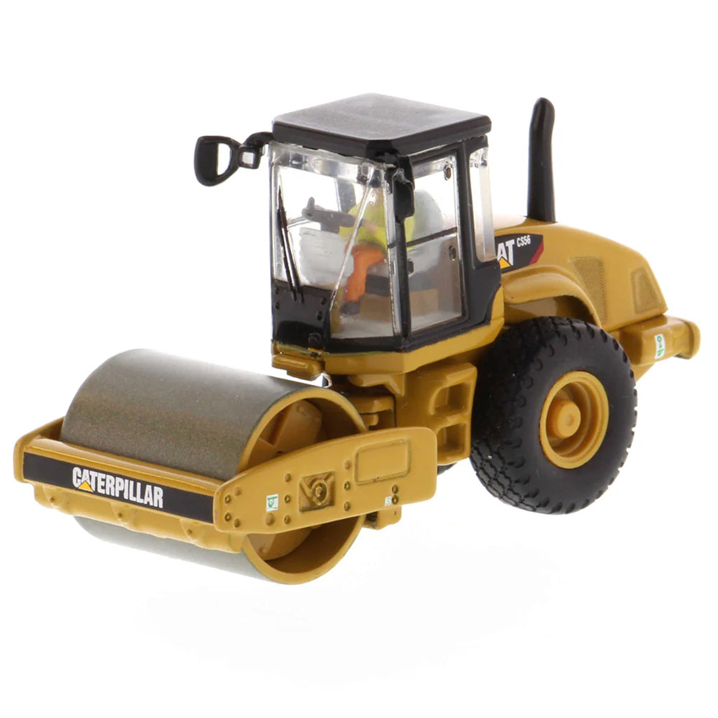 Model of a Caterpillar CS56 Smooth Drum Vibratory Soil Compactor w/Enclosed Cab on a White Background