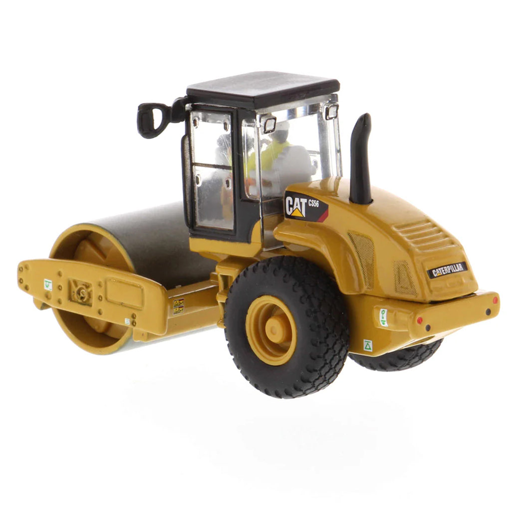 Model of a Caterpillar CS56 Smooth Drum Vibratory Soil Compactor w/Enclosed Cab on a White Background