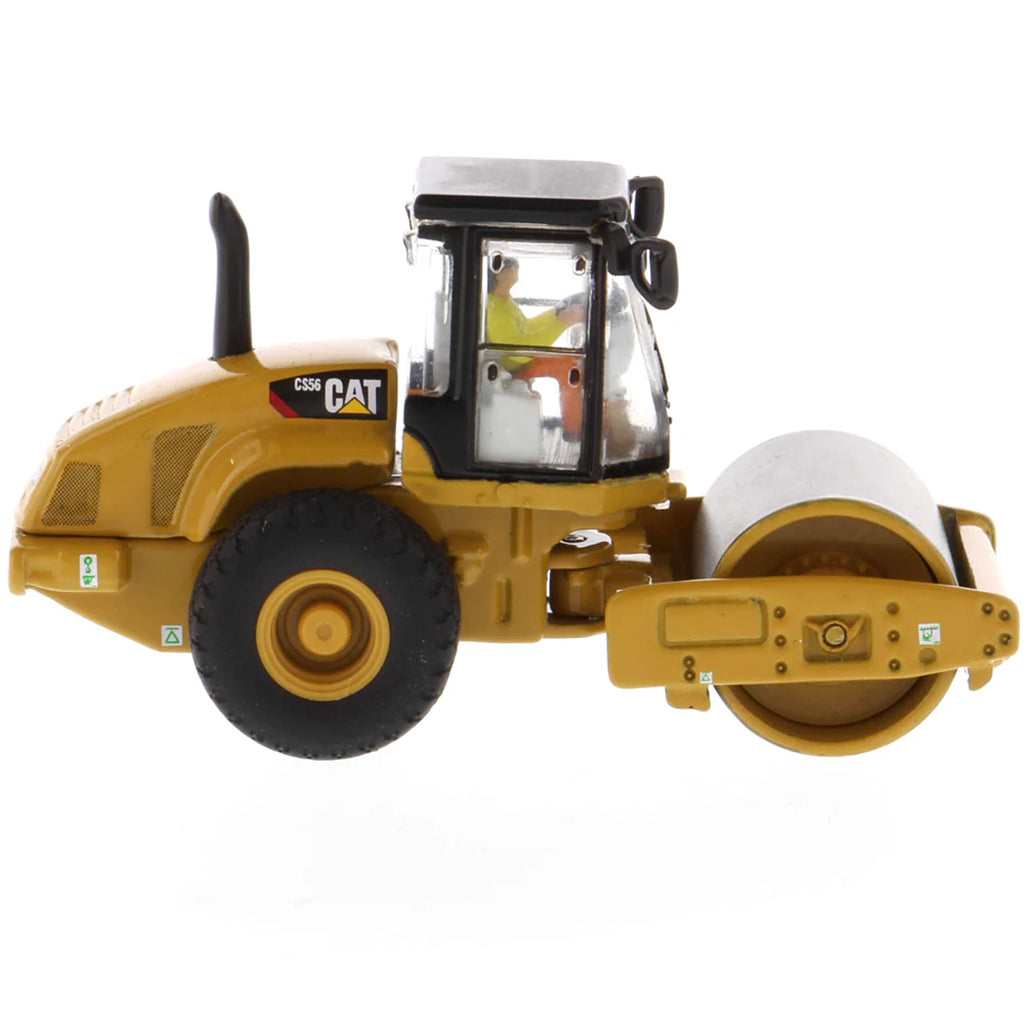 Model of a Caterpillar CS56 Smooth Drum Vibratory Soil Compactor w/Enclosed Cab on a White Background