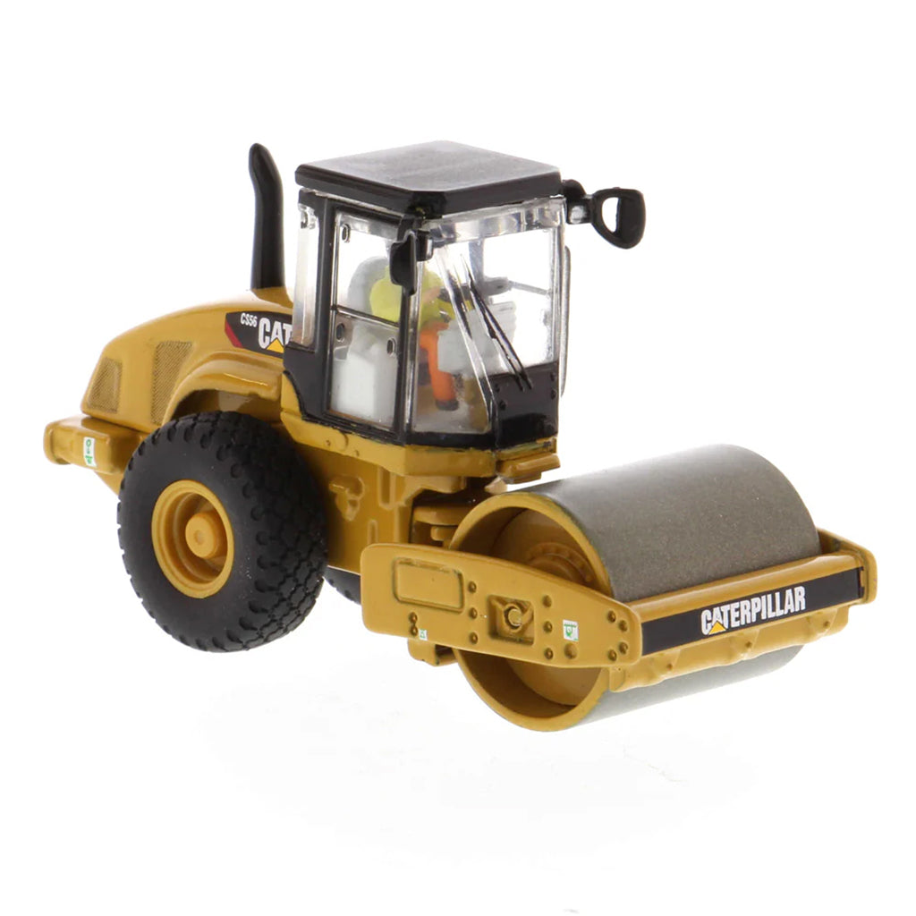 Model of a Caterpillar CS56 Smooth Drum Vibratory Soil Compactor w/Enclosed Cab on a White Background